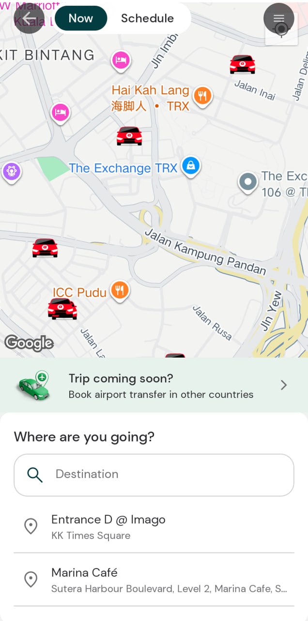 The image shows a screenshot of a map on a mobile device, with a search bar at the bottom and various icons and text overlaid on top of it. The map appears to be a screenshot of a ride-hailing app, with a search bar at the bottom that says "Where are you going?" and a list